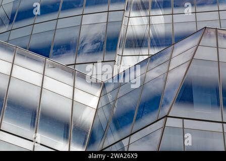 Frank Gehry’s first NYC commission, the billowing-sails-shaped IAC Building, was conceived as metal-clad; the client insisted on white glass instead. Stock Photo