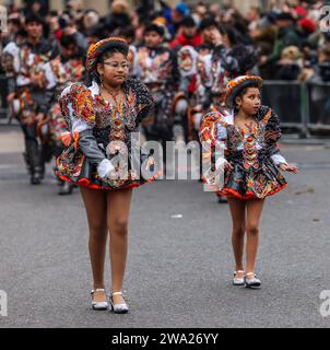 London, UK. 01st Jan, 2024. Crowds line up the streets of Central London today to enjoy The 37th new year's day parade. Credit: Paul Quezada-Neiman/Alamy Live News Stock Photo
