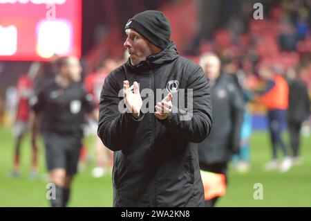 London, England. 1st Jan 2024. Charlton Athletic Head Coach Michael Appleton walks off following the Sky Bet EFL League One match between Charlton Athletic and Oxford United. Kyle Andrews/Alamy Live News Stock Photo