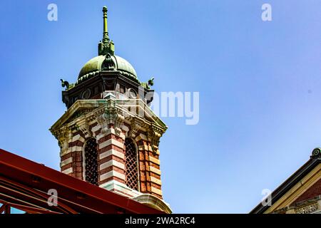 A tower of the Ellis Island Immigration Museum, this was New York's U.S. Customs House, the gateway to America for millions of people. Stock Photo