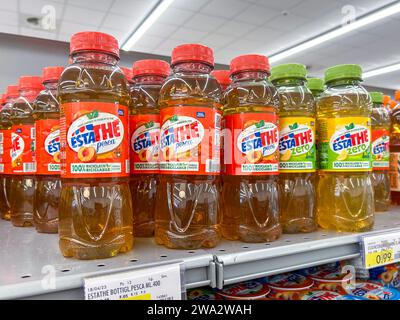 Italy - December 28, 2023: Estathe Ferrero in plastic bottles, peach and sugar-free tea drink, displayed on shelf for sale in Italian supermarket Stock Photo