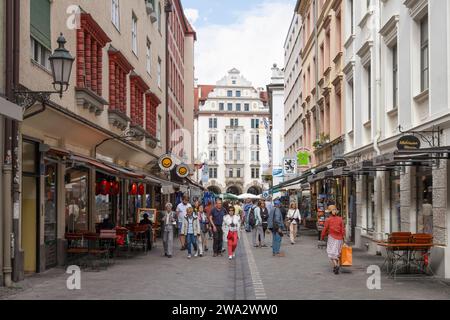 Street with the Orlando-Haus in the background, a well-known beer hall and restaurant in the center of Munich in Germany. Stock Photo