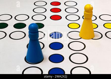 Figures from the well-known board game 'don't get angry' (Ludo). Stock Photo
