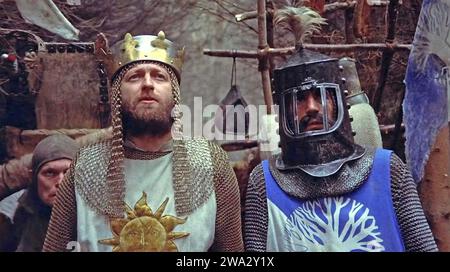 MONTY PYTHON AND THE HOLY GRAIL 1975 EMI Films production with Graham Chapman at left andn and Eric Idle Stock Photo