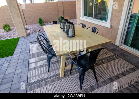 Rear Patio Wooden Table With Six Chairs Stock Photo