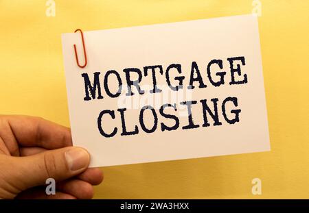 Mortgage Closing is shown using a text. Stock Photo