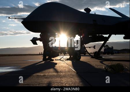 Airmen from the 9th and 29th Aircraft Maintenance Units prepare for a Hellfire exercise at Holloman Air Force Base, New Mexico, Aug. 28, 2023. Hellfire exercises demonstrate the MQ-9’s capabilities and ensure Holloman’s Airmen are mission-capable and combat-ready. (U.S. Air Force photo by Airman 1st Class Michelle Ferrari) Stock Photo