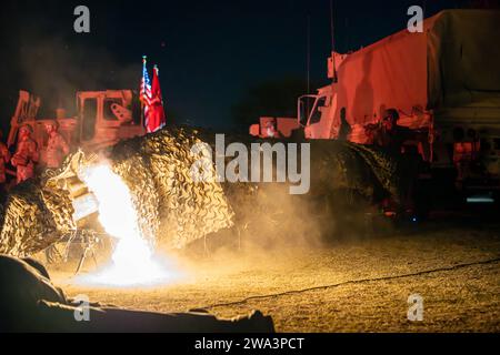 U.S. Army soldiers assigned to the 2nd Engineer Battalion, 3rd Armored Brigade Combat Team, 1st Armored Division fire M240Ls and M249 SAWs as part of the 73rd Burning of The Colors Ceremony held at Fort Bliss, Texas, Nov. 30, 2023. The battalion conducts the ceremony annually to commemorate the courage and sacrifice of those who served during the Battle of Kunu-ri in the Korean War. (U.S. Army photo by Spc. David Poleski) Stock Photo