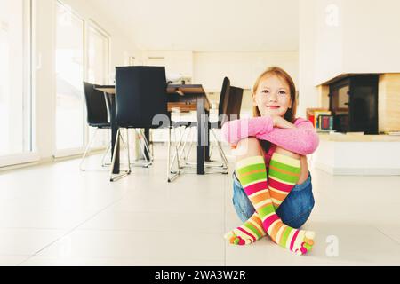 Legs View Of Happy Family Wearing Warm Socks In Front Of Fireplace Focus On  Left Socks Stock Photo - Download Image Now - iStock
