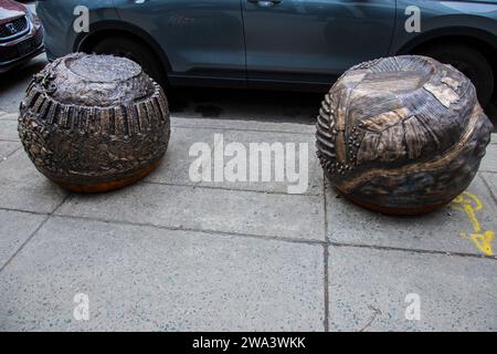 Indigenous contributions bronze sculpture on Peel Street in downtown Montreal, Quebec, Canada Stock Photo