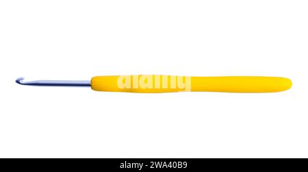 Yellow Crochet Hook Cut Out on White. Stock Photo