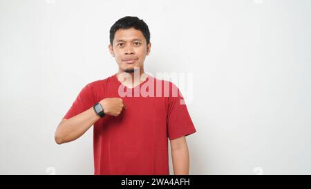 Asian man is using sign language with hand against white background. learn sign language by hand. ASL American Sign Language Stock Photo