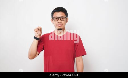 Asian man is using sign language with hand against white background. learn sign language by hand. ASL American Sign Language Stock Photo