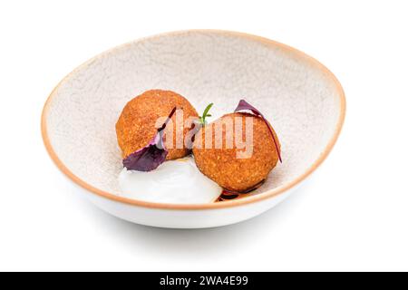 Homemade Fried Sicilian Arancini stuffed with meat, with tomato sauce Stock Photo