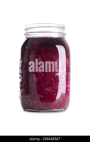 Red cabbage, homemade fermented German Blaukraut in a glass jar. Cut raw red cabbage, fermented by lactic acid bacteria. Stock Photo