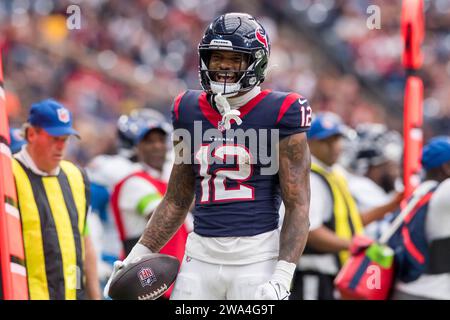 December 31, 2023: Houston Texans wide receiver Nico Collins (12) reacts after gaining a first-down during a game between the Tennessee Titans and the Houston Texans in Houston, TX. ..Trask Smith/CSM (Credit Image: © Trask Smith/Cal Sport Media) Stock Photo