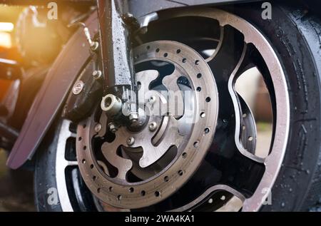 Bobruisk, Belarus - November 8, 2022: Element of a Harley-Davidson motorcycle, front wheel. Stock Photo