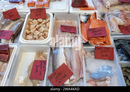 Various types of fish fillet for sale at a market Stock Photo