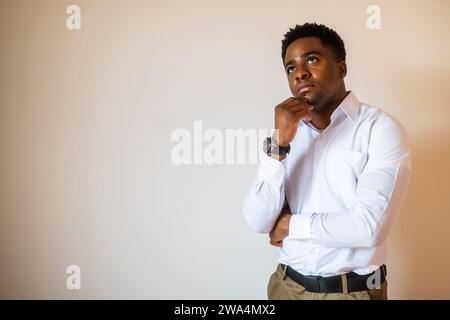 Portrait of young businessman who is thoughtful and worried. Stock Photo