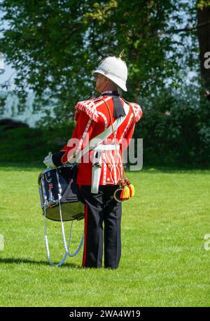 Royal Welsh Guards drummer celebrate the reaffirmation for their Freedom of the County in the grounds of Hay Castle Powys Wales UK. May 2023 Stock Photo