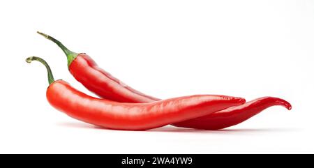 Two red hot chilli peppers isolated on white background. Stock Photo