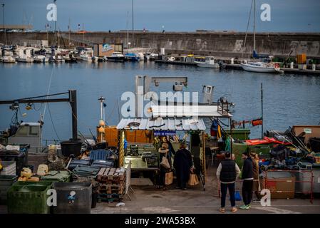 Fishmongers in the port of Sète, a major port city in the southeast French region of Occitanie, France Stock Photo