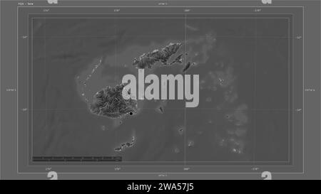 Fiji highlighted on a Grayscale elevation map with lakes and rivers map with the country's capital point, cartographic grid, distance scale and map bo Stock Photo