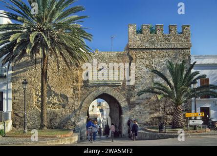 Fortified gate, sign commemorating conquest of city in 1292, at Avenida de Andalucia in Tarifa, Costa de la Luz, Andalusia, Cadiz Province, Spain Stock Photo