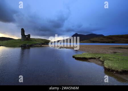 Sunset view over Ardvreck Castle on Loch Assynt, Sutherland, North West Scotland, UK Stock Photo