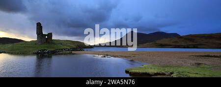 Sunset view over Ardvreck Castle on Loch Assynt, Sutherland, North West Scotland, UK Stock Photo