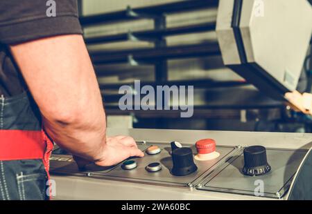 Caucasian Professional Metalworking Machine Operator Close Up Stock Photo