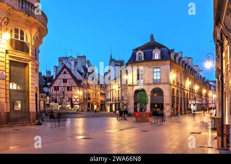 Night along Route de la Liberte as it intersects Place Francois Rude (or place du Bareuzai) in the old town of Dijon, France. Stock Photo