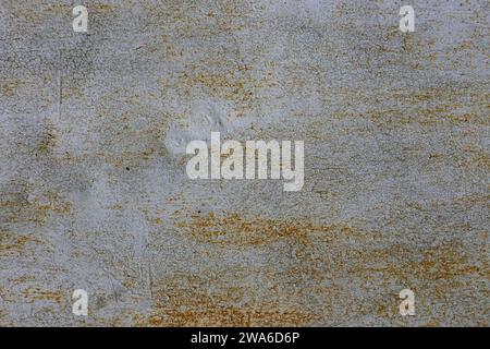 gray metal texture from rusty old iron shabby wall. Grunge rusty orange-brown, gray metal. Stock Photo