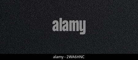 Rough matte black metal texture background with structure close up view Stock Photo