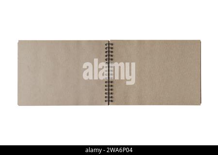 Open spiral bound notepad with two craft brown sheets, isolated on white background. Top view, copy space for text, template, mockup Stock Photo
