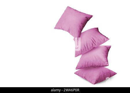 Stack of pink pillows isolated on white background. Pile of  decorative cushions for sleeping and resting, home interior, house decor. Stock Photo
