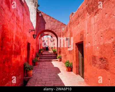 Stunning architectures of the ancient Santa Catalina monastery with bright red walls, Arequipa, Peru Stock Photo
