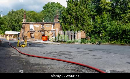 THE CROOKED HOUSE PUB, MORNING AFTER THE FIRE Stock Photo