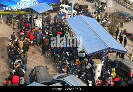 January 02,2024, Srinagar Kashmir, India : A view of petrol filling station in Srinagar. Massive rush at fuel stations across the Srinagar city amid n Stock Photo