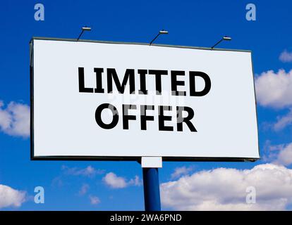 Limited offer symbol. Concept words Limited offer on beautiful big white billboard. Beautiful blue sky cloud background. Business marketing, motivatio Stock Photo