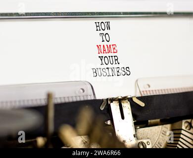 How to name your business symbol. Concept words How to name your business typed on beautiful old retro typewriter. Beautiful white background. How to Stock Photo
