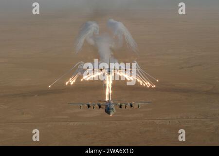 US military forces. Aerial shot over Iraq of a KC-130 from Marine Aerial Refueler Transport Squadron (VMGR) 234 firing flares that are used to counter attack surface to air missles on September 4, 2003 .  U.S. Marines are currently deployed to Southwest Asia in support of Operations Enduring Freedom and Iraqi Freedom. (U.S. Marine Corps photo by LCpl Andrew Williams) (Released) Stock Photo