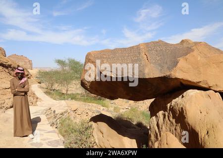 Tour guide at Jabal Ikmah in Saudi Arabia Stock Photo