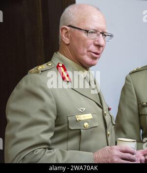 US military forces. 18th Chairman of the Joint Chiefs of Staff Gen. Martin E. Dempsey and Chief of Army Staff Gen. Raymond T. Odierno talk with  Austrian Chief of the Defense Force Gen. David Hurley at National Defense University on Fort Lesley J. McNair in Washington D.C., Nov. 21, 2013. DoD photo by Staff Sgt. Sean K. Harp Stock Photo