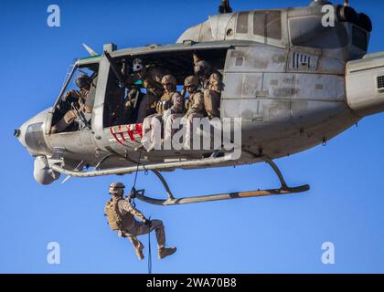 US military forces. 130611SO289-010 KING FAISAL AIR BASE, Jordan (June 11, 2013) A U.S. Marine assigned to the Maritime Raid Force of the 26th Marine Expeditionary Unit (26th MEU) rappels from a UH-1N Huey helicopter assigned to Marine Medium Tiltrotor Squadron (VMM) 266 (Reinforced), during a helicopter rope suspension technique exercise as part of Exercise Eager Lion 2013,  Eager Lion is an annual  multinational exercise designed to strengthen military-to-military relationships and enhance security and stability in the region by responding to modern-day security scenarios. (U.S. Marine Corps Stock Photo