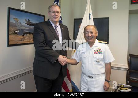 US military forces. Deputy Secretary of Defense Bob Work poses for a photo with Chairman of the Japan Joint Staff, Admiral Katsuyoshi Kawano as he arrives at the Pentagon to discuss matters of mutual importance July 16, 2015. (Photo by Master Sgt. Adrian Cadiz)(Released) Stock Photo