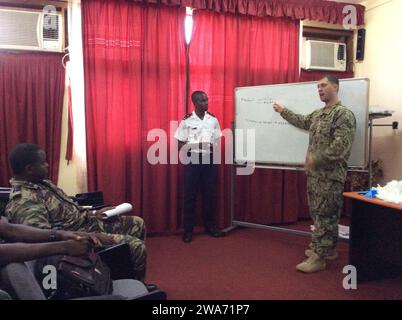 US military forces. 150923ZZ999-300 DOUALA, Cameroon  (Sept. 23, 2015) Lt. Chris Jordan, intelligence officer for Commander, Task Force 68 (CTF 68) discusses the basic intel cycle to Cameroon military forces Sept. 23, 2015. The training was a coordinated effort between CTF 68 and Marines from U.S. Marine Corps Forces Europe and Africa and Special Purpose Marine Air Ground Task Force-Crisis Response-Africa. (U.S. Marine Corps photo by Maj. Oliver Talbott/Released) Stock Photo
