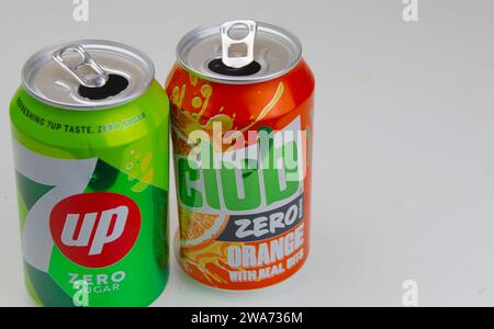 Dublin, Ireland - January 3rd 2024: A  close up photo of seven up and club zero soda fizzy drink cans on a white surface. Stock Photo