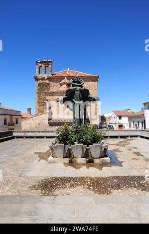 San Pedro de Alcantara statue, at bottom San Pedro de Alcantara church (18th century). Alcantara, Caceres, Extremadura, Spain. Stock Photo