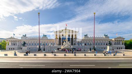 The Austrian Parliament Building and the Pallas Athena Fountain in Vienna, Austria Stock Photo